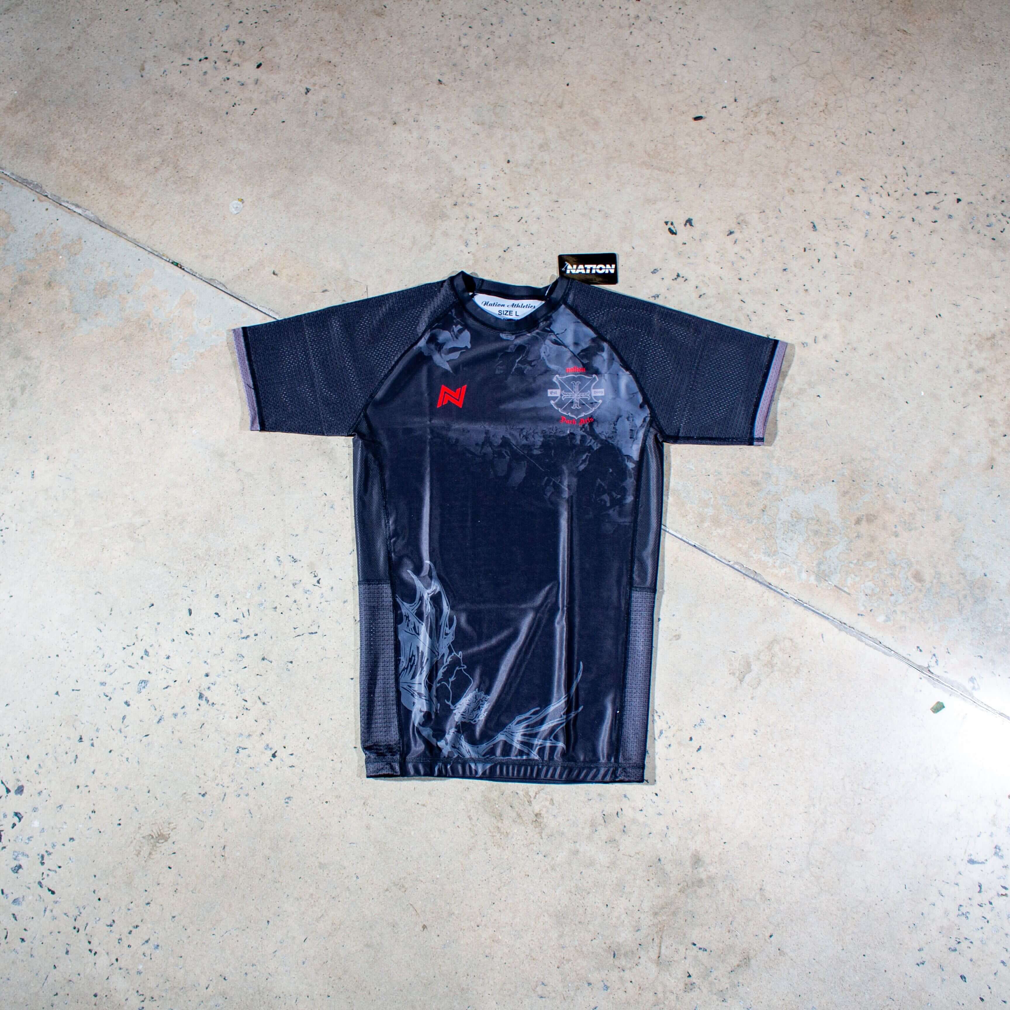 Black Dark Arts BJJ Rash Guard with waffle tech fabric for No-Gi Jiu Jitsu training.