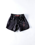 Black BJJ grappling shorts with elasticated waist, durable 4-way stretch fabric, and sublimated graphics; ideal for MMA and No-Gi training.