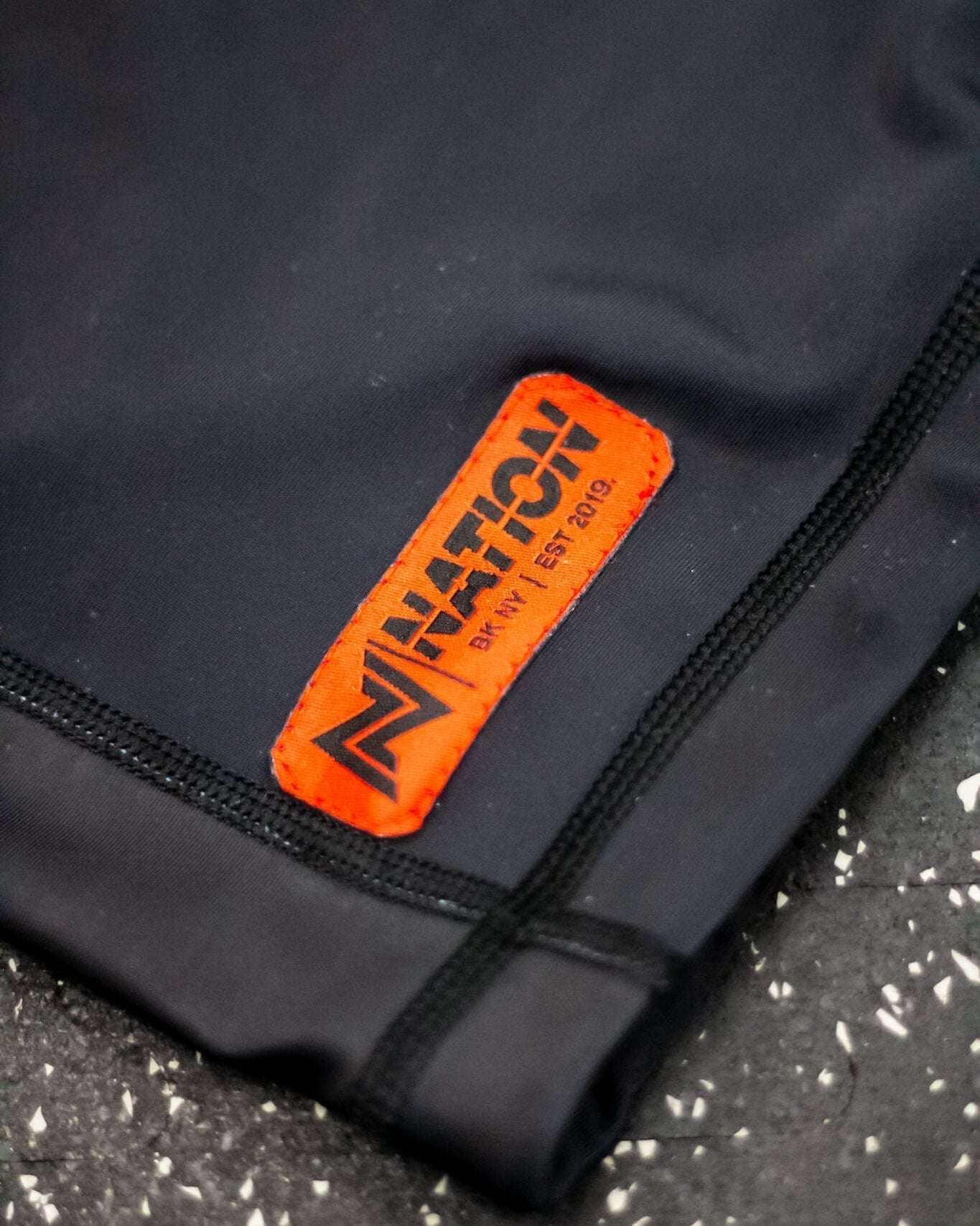 bjj rash guard close up of woven label patch