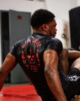 BJJ Rash Guard in Black with Death Cuddles in action 6