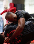 BJJ Rash Guard in Black with Death Cuddles in action 5