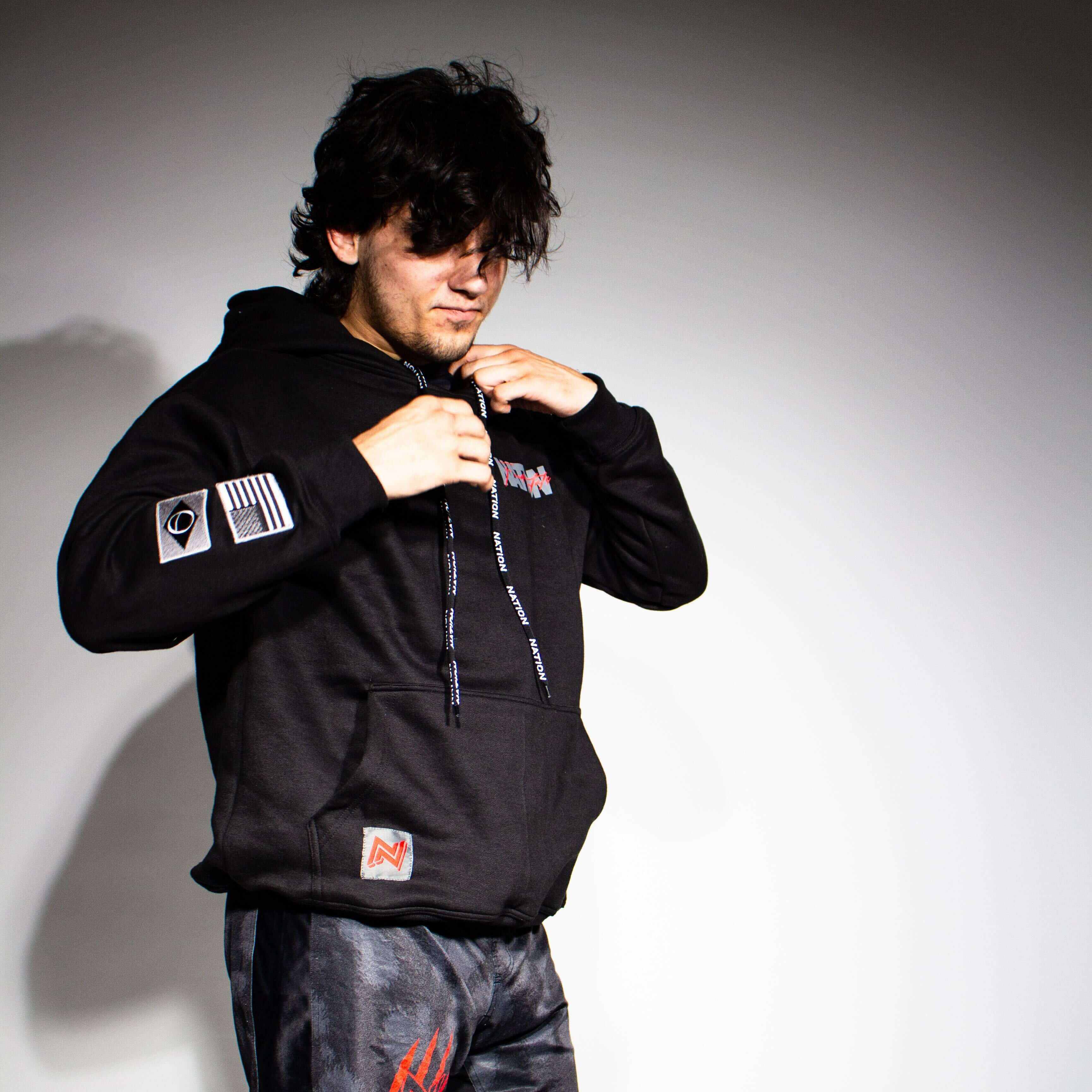 BJJ Hoodie – Jiu-Jitsu Fundamentals | Nation Athletic BJJ | Black | Premium hoodie | back with model