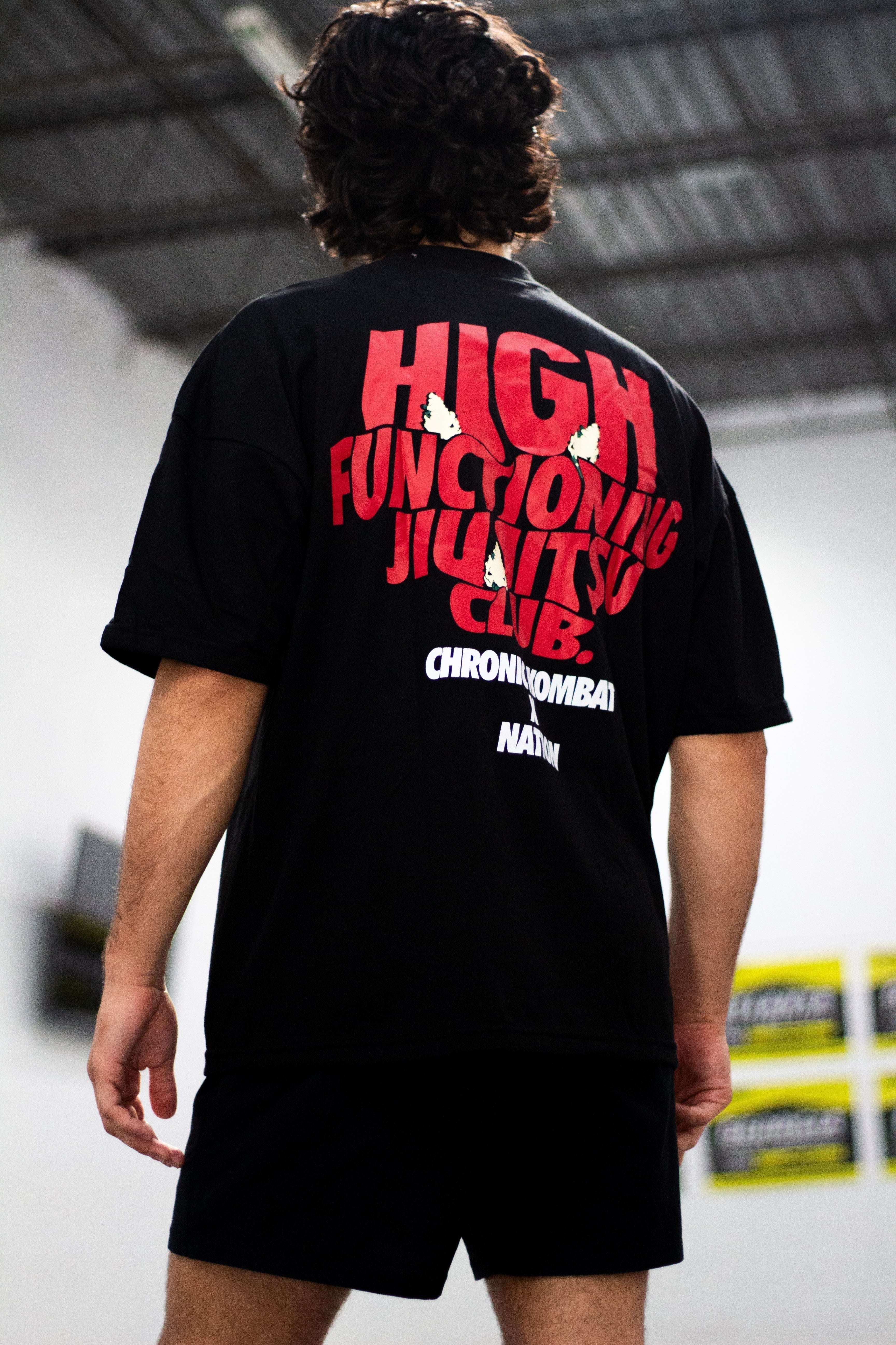 Black High Functioning Jiu Jitsu Club Edition BJJ Tee with bold red lettering, oversized fit.