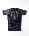 Lightweight black BJJ rash guard with "Death Cuddle" design, ideal for durable and flexible no-gi training.