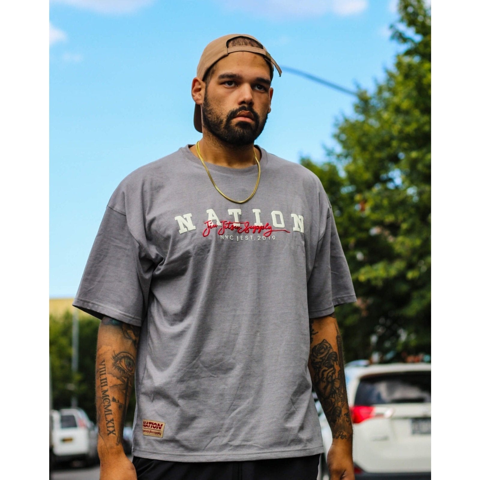 Nation Varsity BJJ T-shirt with puff print, oversized fit in soft cotton blend.