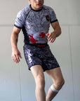 White short sleeve BJJ rash guard with Rising Dragon design for No-Gi Jiu Jitsu and MMA.