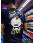 Black "Notorious" BJJ T-shirt with hip hop-inspired design, celebrating 50 years of hip hop, worn near colorful store shelves.