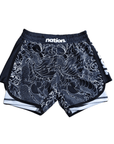 Blue female grappling shorts featuring traditional dragon artwork, designed for comfort and mobility.