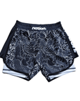 Blue female grappling shorts featuring traditional dragon artwork, designed for comfort and mobility.