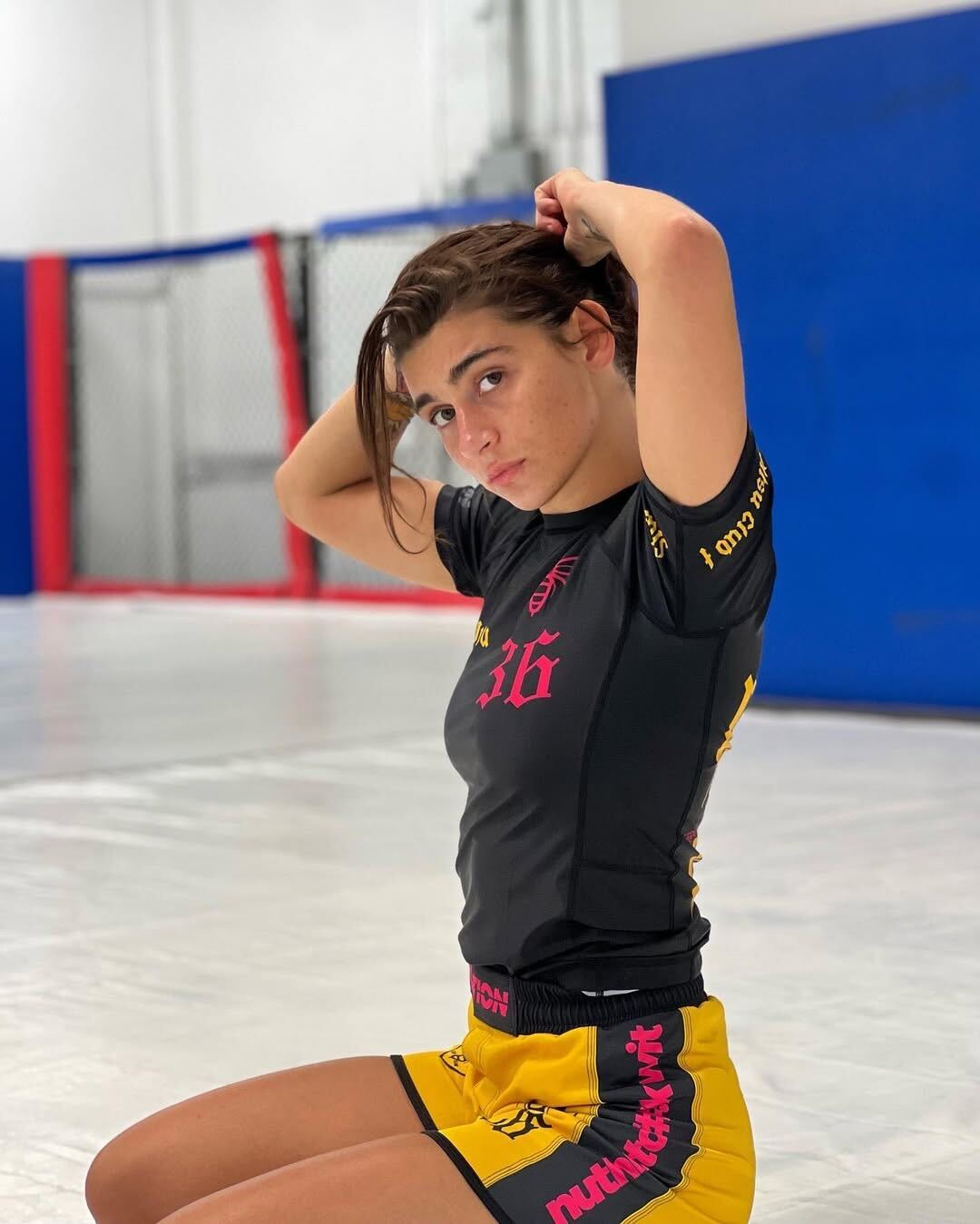 Wu jitsu BJJ Rash Guard and BJJ grappling shorts female Sitting