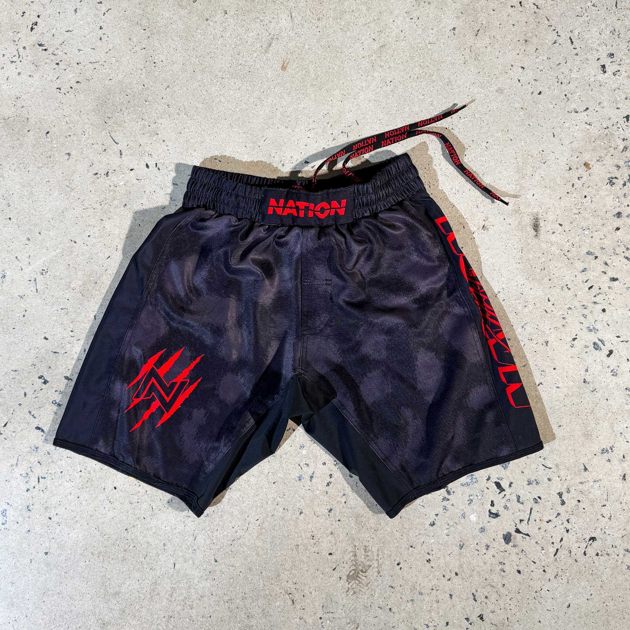 BJJ grappling shorts with animal print, featuring elasticated waist, drawstring, and durable material.