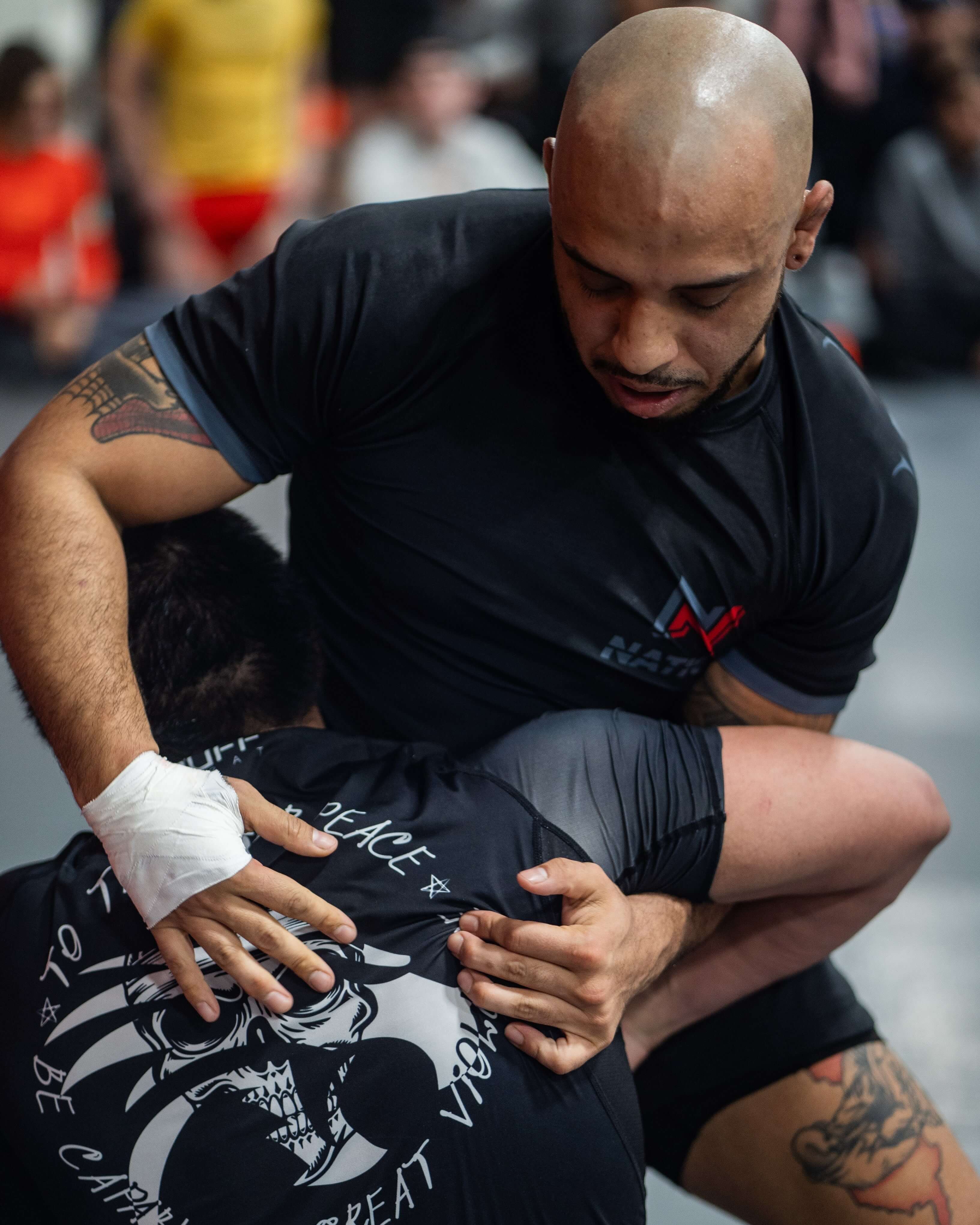 Nation Athletic BJJ Rash Guard and BJJ Shorts Set training image of Jon Romero
