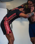 Cucuy Hunter BJJ Rash Guard Set in action during grappling training.