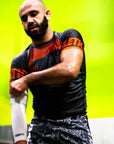 IBJJF ranked BJJ Rash Guard brown in action