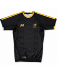 Black mexico bjj rash guard jersey with yellow accents on a white background