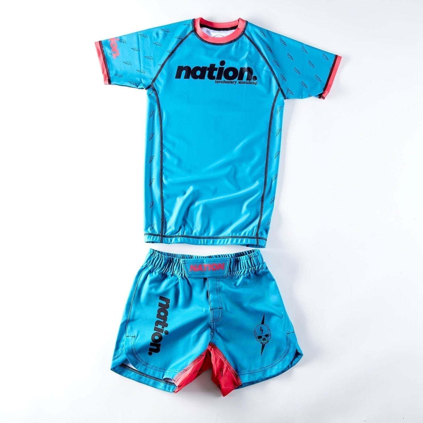 Women's BJJ Rash Guard Set by Nation Athletic, blue and red, premium NoGi Jiu Jitsu gear.