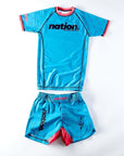 Women's BJJ Rash Guard Set by Nation Athletic, blue and red, premium NoGi Jiu Jitsu gear.