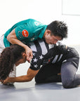 Odyssey Invitational BJJ Rash Guard with striped design for No-Gi Jiu Jitsu grappling and MMA.