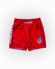 Red BJJ shorts with 'Nation' branding on a white background