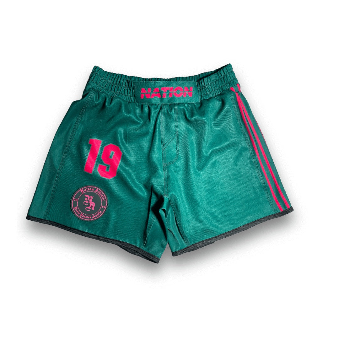 Green women's BJJ grappling shorts by Hooligans, featuring high-rise fit and sublimated artwork.