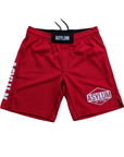Red shorts with 'Asylum' branding on a white background