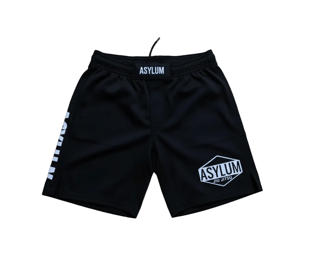 Black shorts with 'Asylum' branding on a white background