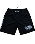 Black shorts with 'Asylum' branding on a white background