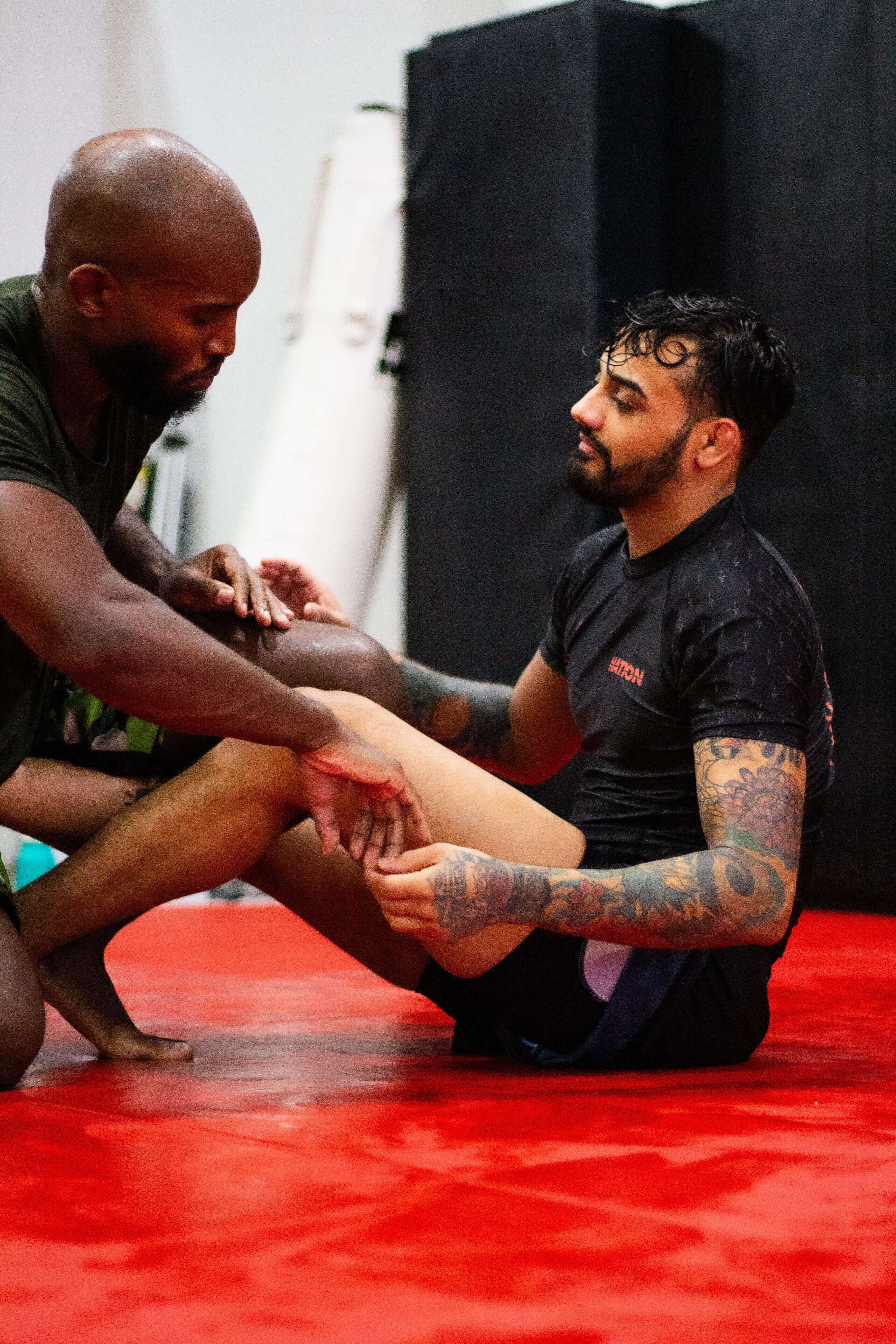 BJJ Rash Guard in Black with Death Cuddles in action 3