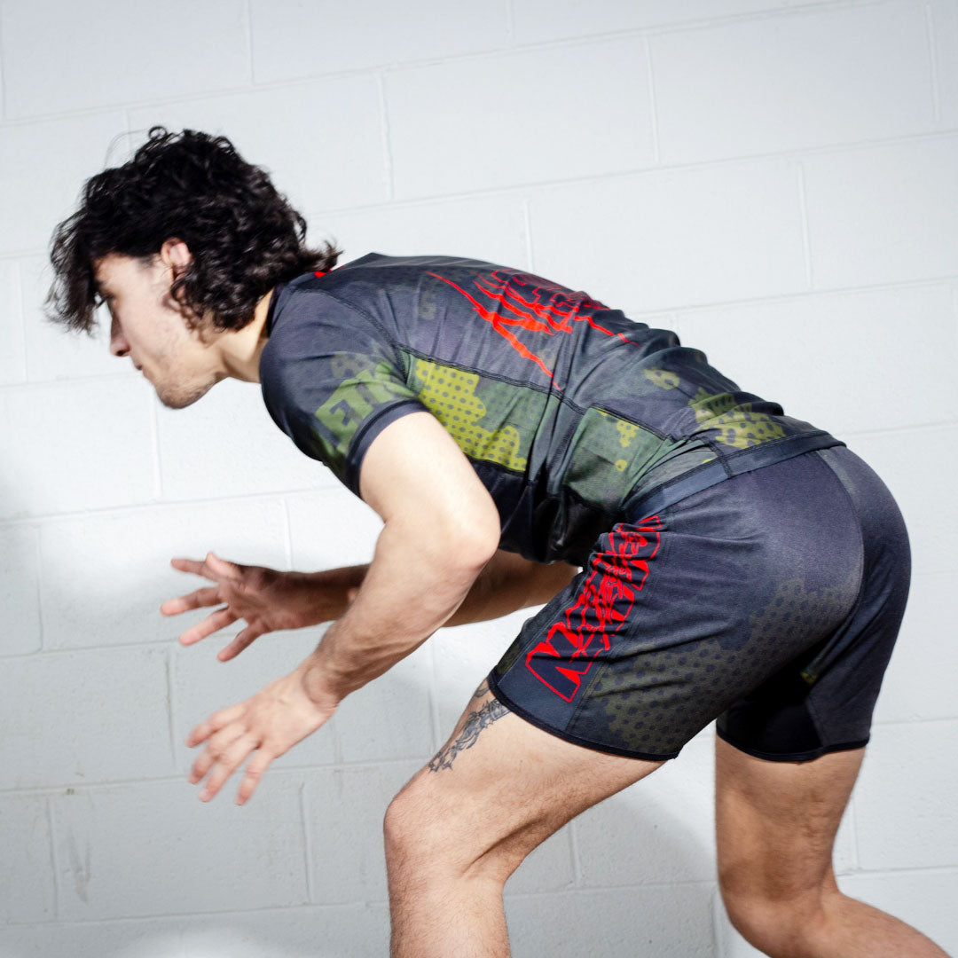 Camo BJJ Rash Guard Set with BJJ Shorts  model in combat stance