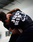 Athlete wearing Just Rip It BJJ rash guard designed for no-gi training and grappling performance