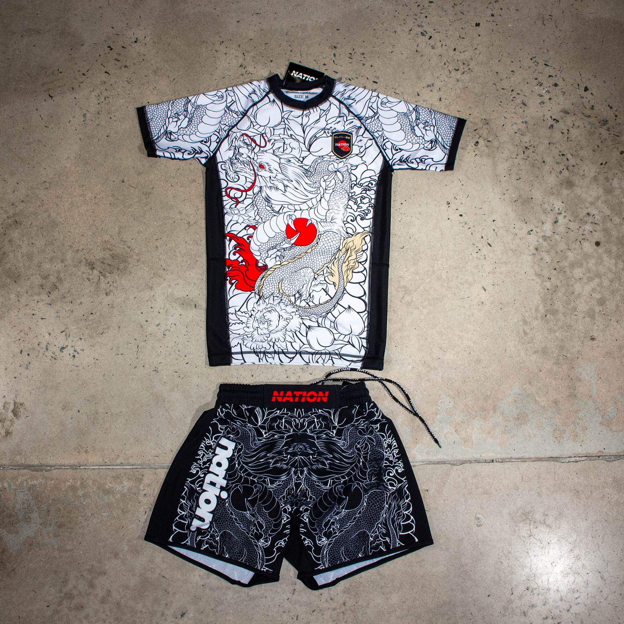 Multicolor Rising Dragon BJJ Rash Guard Set for men, featuring premium No-Gi training gear for Jiu Jitsu and MMA.