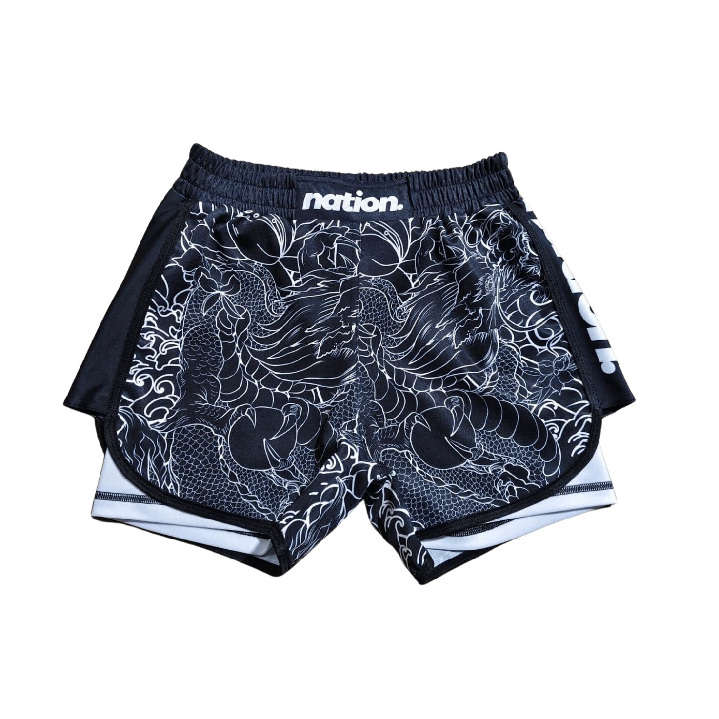 Blue female grappling shorts featuring traditional dragon artwork, designed for comfort and mobility.