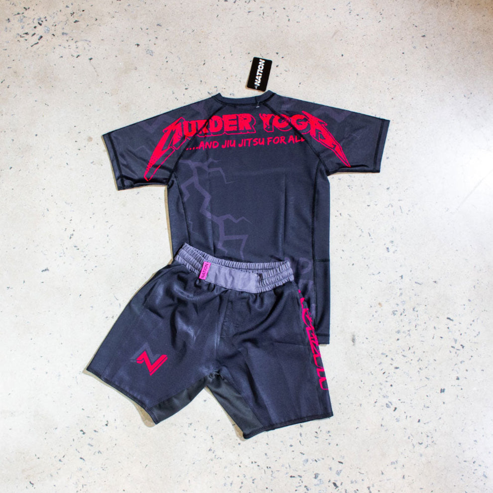 Murder Yoga Black BJJ Rash Guard Set with Grappling Shorts from Nation Athletic, featuring tailored fit and durable fabric.