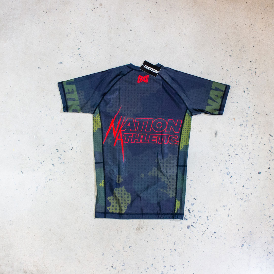 Fatigues Camo BJJ Rash Guard by Nation Athletic – Durable, comfortable camouflage design for Jiu-Jitsu.