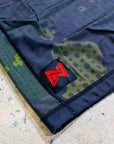 BJJ Rash Guard by Nation Athletic Flatlay Image close up detail