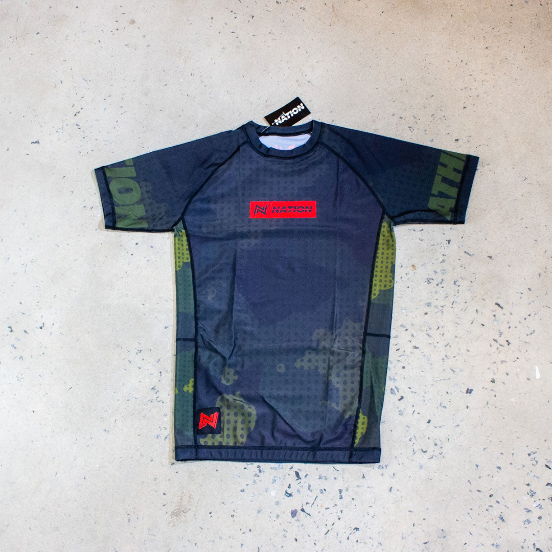 BJJ Rash Guard by Nation Athletic Flatlay Image front