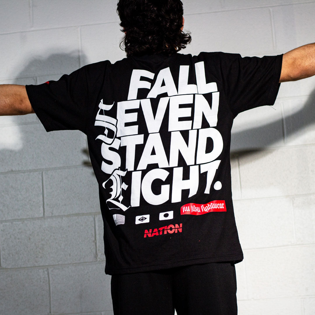 &quot;Fall Seven, Stand Eight&quot; black BJJ t-shirt with bold statement print by Nation Athletic.