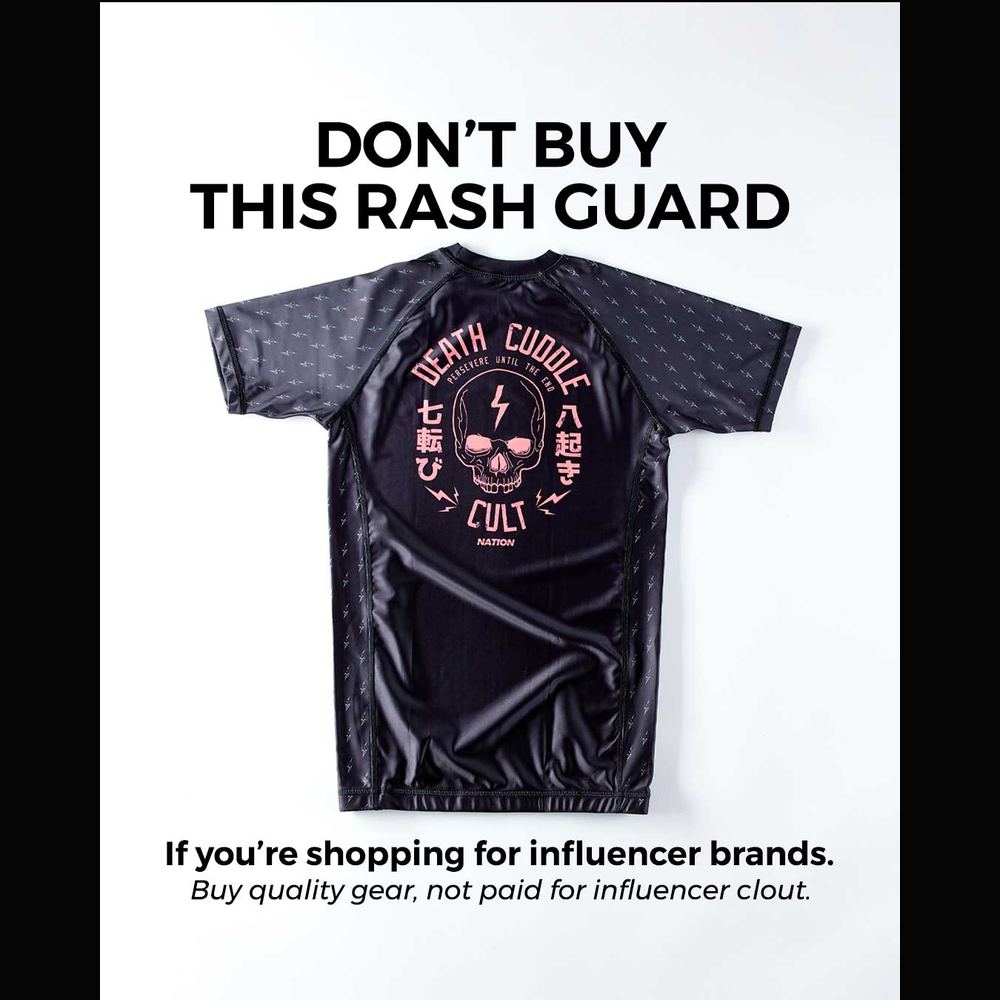 Death Cuddles rash guard — Buy quality gear, not influencer clout.