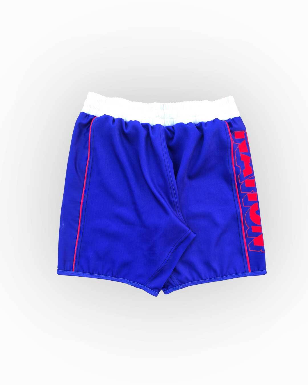 Blue shorts with red and white accents on a white background