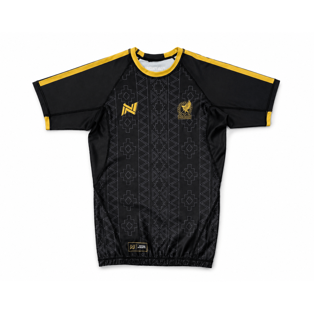 Black mexico bjj rash guard jersey with yellow accents on a white background