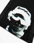 Black bandana featuring a stylized graphic print of a NWA's Eazy-E wearing a white Compton cap and white aviator sunglasses, with a black paisley border.