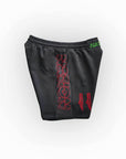 Black shorts with red and green text on a white background
