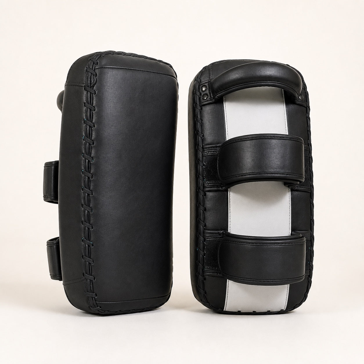 Unbranded custom Thai kick pad product-option render showing face and rear handle views