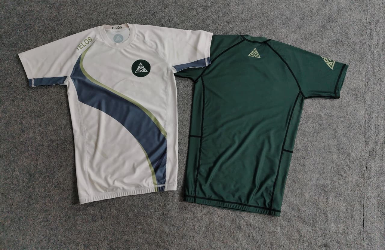 Completed custom BJJ rash guards made for a martial arts academy